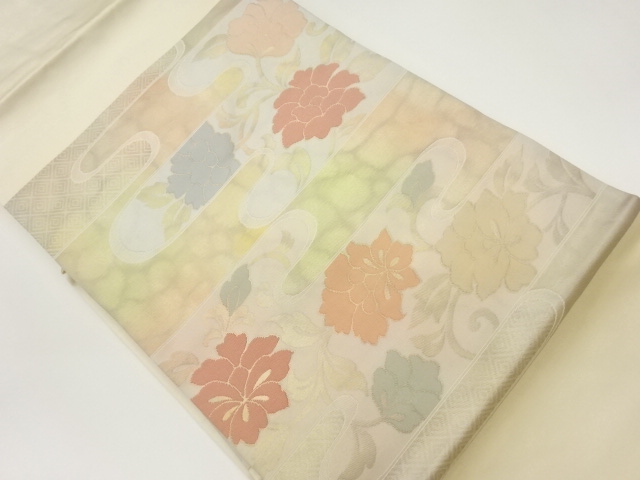 ヱ霞に花唐草模様織出し名古屋帯